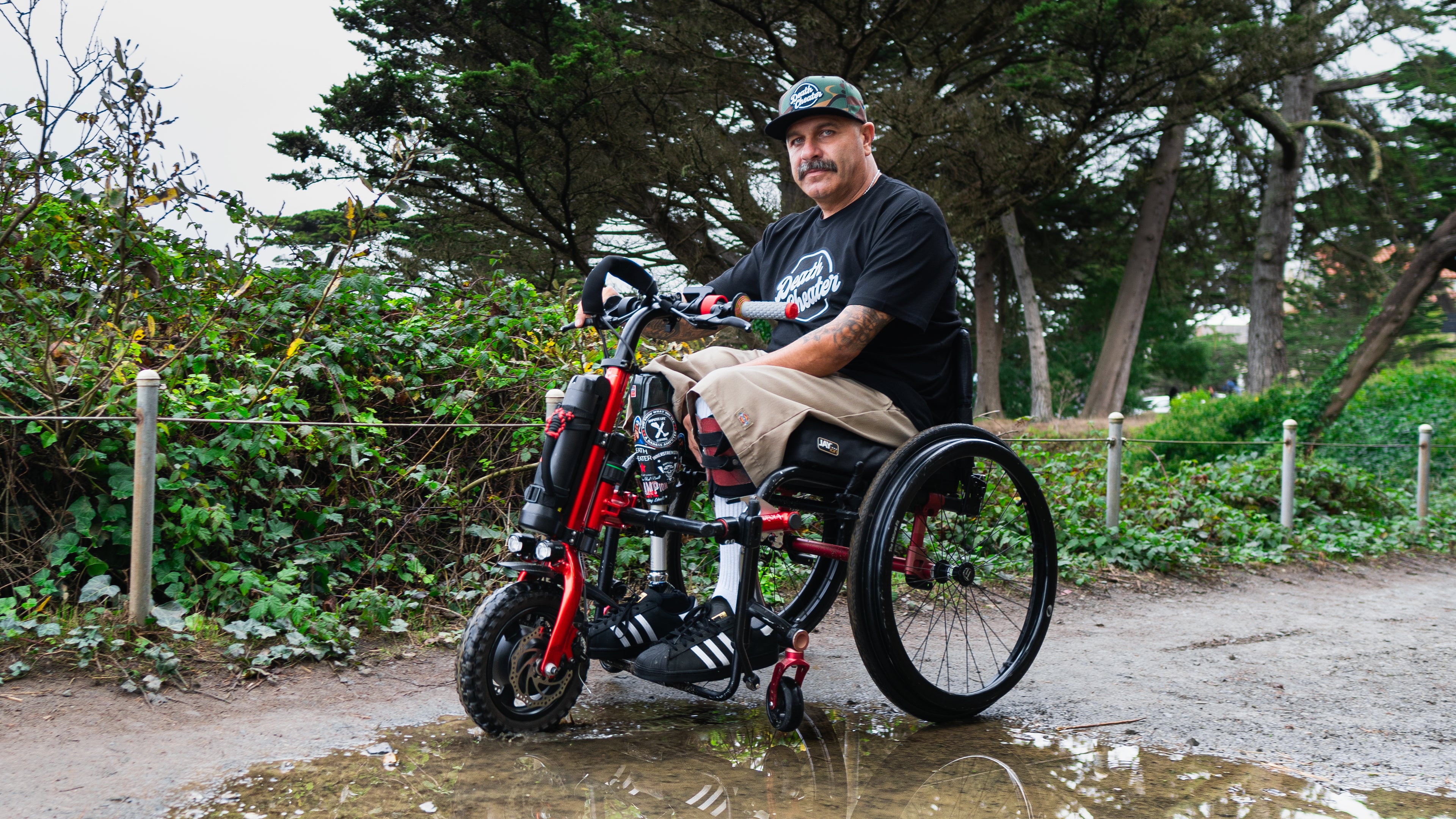 Amplife® & Amplife® Foundation Founder Abdul Nevarez in San Francisco on his Firefly 2.5 wearing the Death Cheater™ Halo T-Shirt and Flat Bill Snapback.