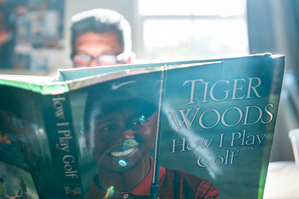 ABDUL NEVAREZ READING TIGER WOODS HOW I PLAY GOLF