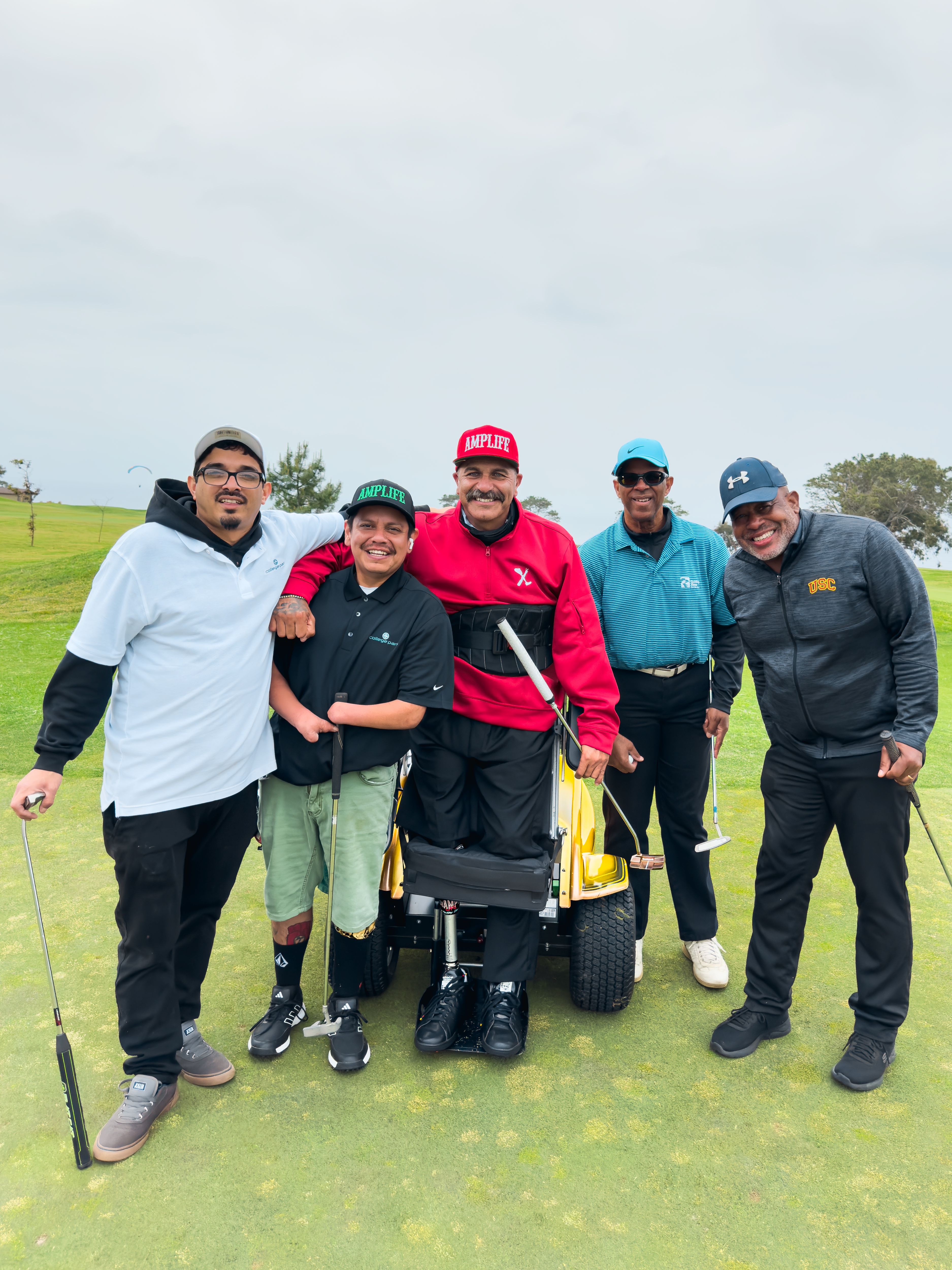 Amplife® & Amplife® Foundation Founder Abdul Nevarez and Team Amplife® Ambassador Oscar Loreto, Jr. and friends at Torrey Pines North Course on a green.